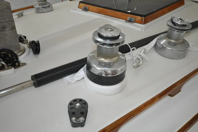 Slide: The Image of Deck equipment on a 1986 Hinckley Sou'wester 51 sailboat, featuring winches and rigging. - 62