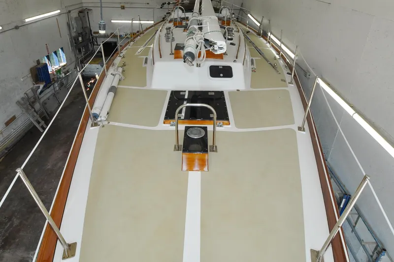 Slide: The Image of 1986 Hinckley Sou'wester 51 sailboat deck in a workshop setting. - 72