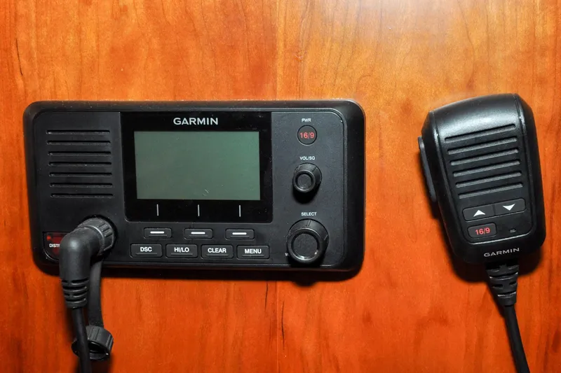 Slide: The Image of Garmin marine radio and microphone on Hinckley Sou'wester 51, 1986 model. - 80