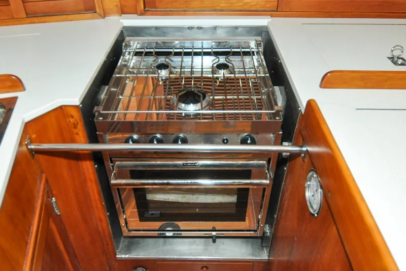 Slide: The Image of Galley stove and oven in 1986 Hinckley Sou'wester 51 yacht kitchen. - 95