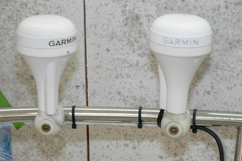 Slide: The Image of Two Garmin marine antennas mounted on a Hinckley Sou'wester 51, 1986 model. - 22