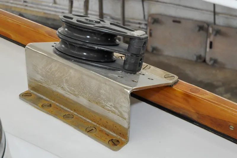 Slide: The Image of Winch on 1986 Hinckley Sou'wester 51 sailboat, mounted on polished metal and wood surface. - 26