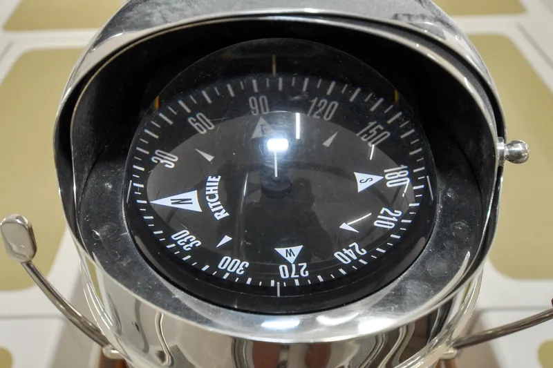 Slide: The Image of Ritchie compass on 1986 Hinckley Sou'wester 51 yacht, close-up view. - 36