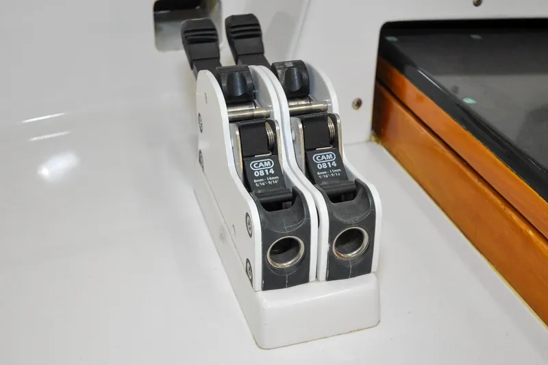 Slide: The Image of Cam cleats on 1986 Hinckley Sou'wester 51 sailboat, close-up view. - 43