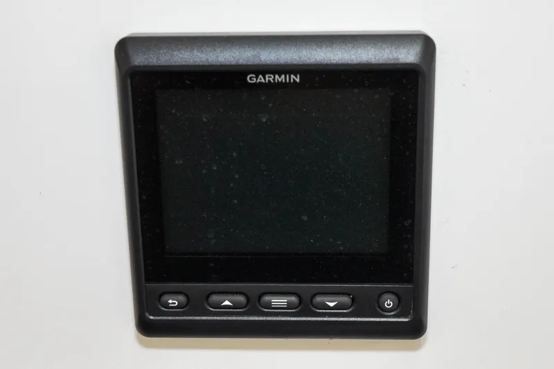 Slide: The Image of Garmin display on 1986 Hinckley Sou'wester 51 yacht, featuring navigation controls. - 49