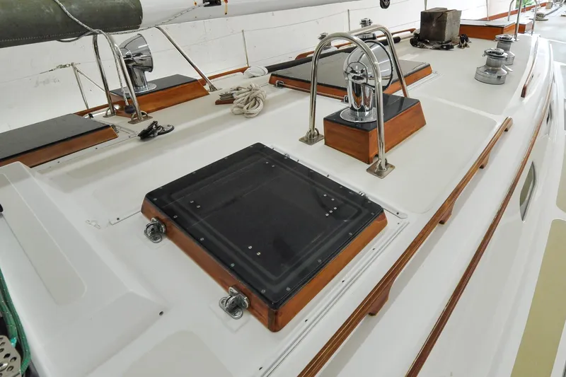 Slide: The Image of 1986 Hinckley Sou'wester 51 yacht deck with winches and hatches. - 55