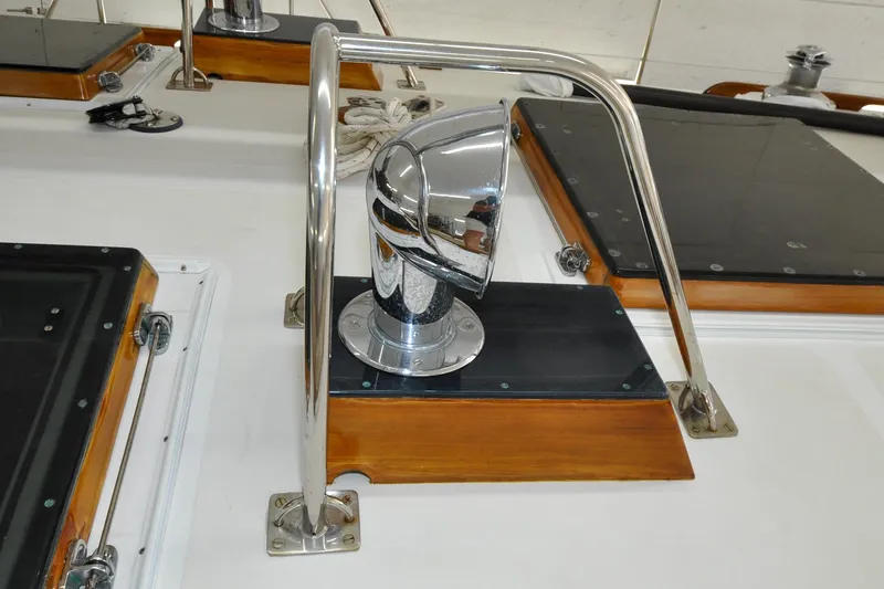 Slide: The Image of Chrome vent detail on 1986 Hinckley Sou'wester 51 yacht deck. - 56