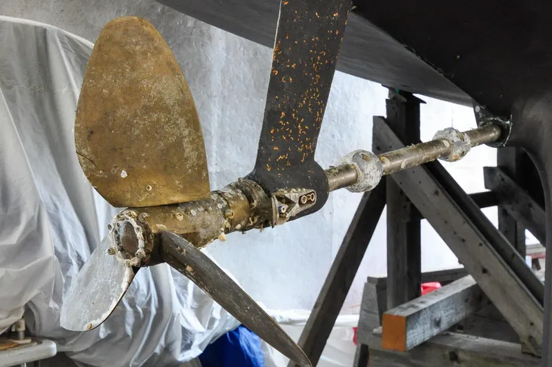 Slide: The Image of Propeller and rudder of 1986 Hinckley Sou'wester 51 sailboat in dry dock. - 7
