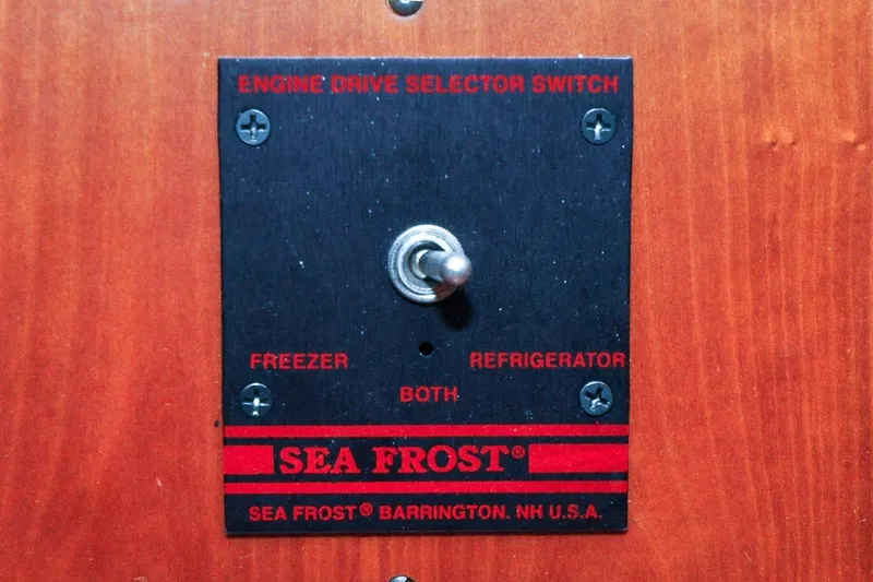 Slide: The Image of Sea Frost engine drive selector switch on 1986 Hinckley Sou'wester 51 yacht. - 84