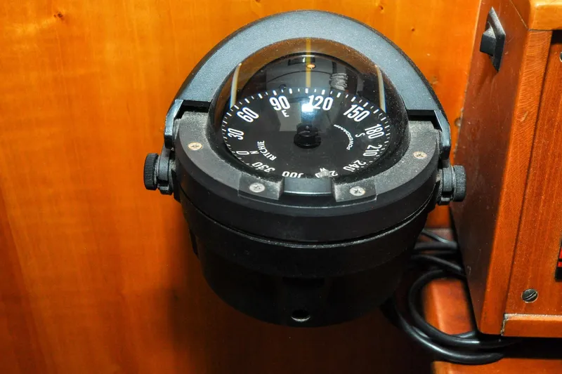 Slide: The Image of Compass on 1986 Hinckley Sou'wester 51 yacht, mounted on wooden panel. - 86