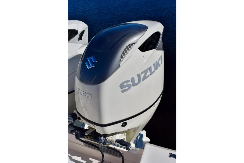 Slide: The Image of Suzuki 350 outboard motor on 2006 Grady-White Bimini 306 boat. - 16