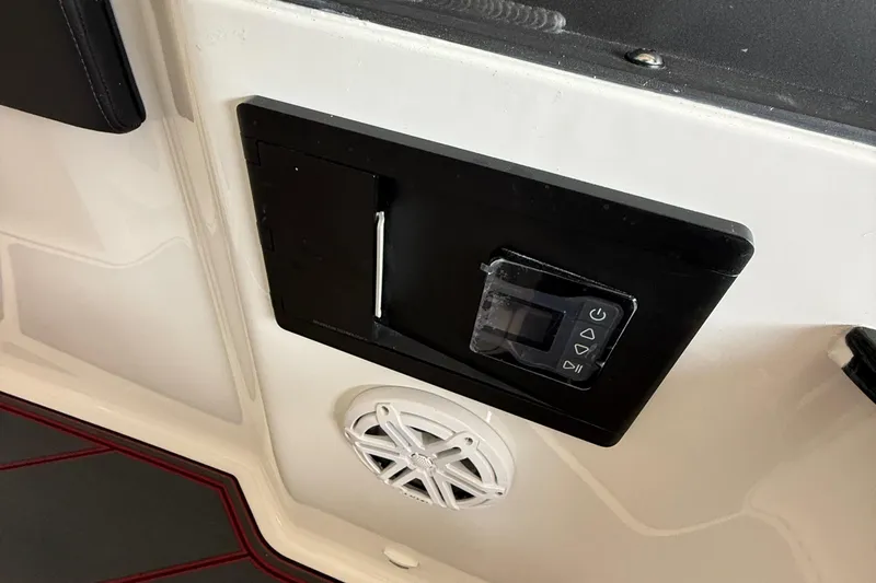 Slide: The Image of Control panel and speaker on 2026 Monterey Elite 27 SD boat interior. - 12