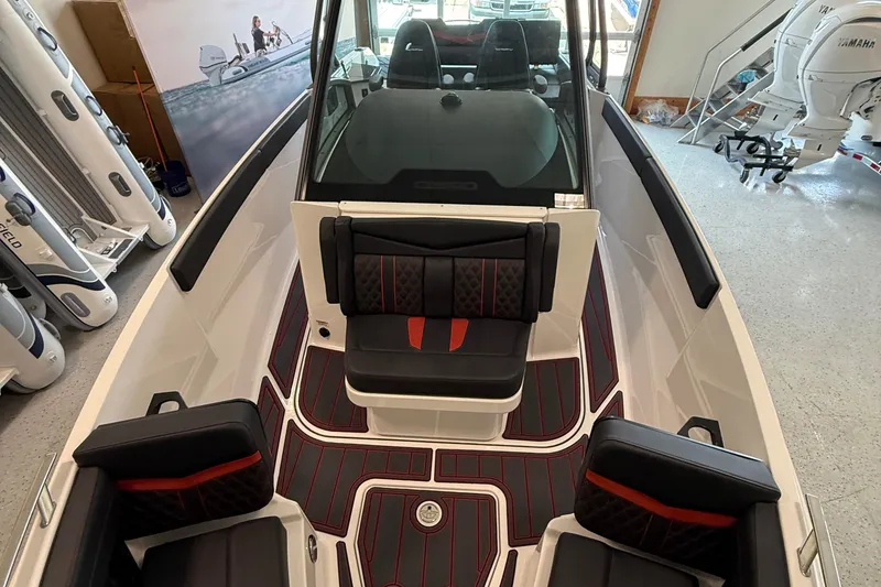 Slide: The Image of 2026 Monterey Elite 27 SD boat interior with stylish seating and modern design. - 19