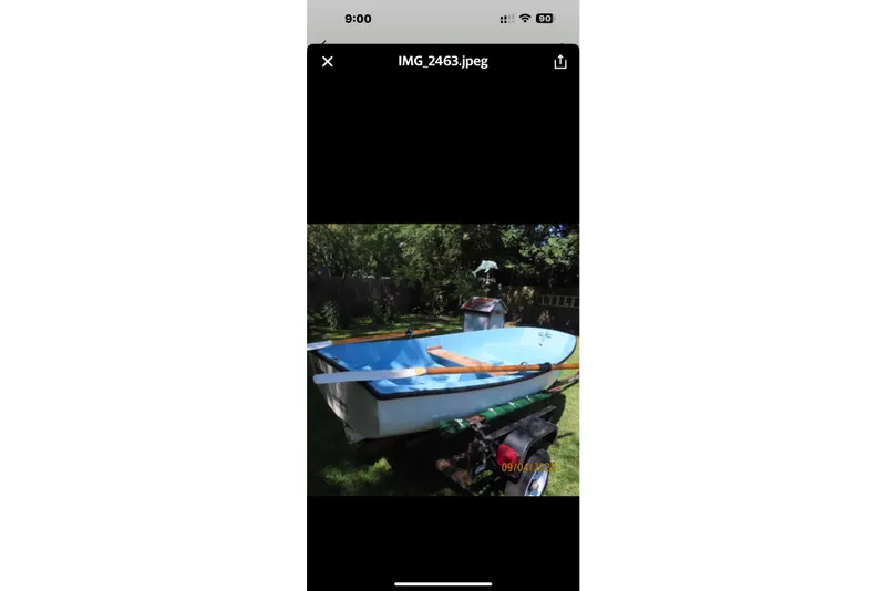 Slide: The Image of 1993 Pacific Seacraft 34 boat on trailer in sunny backyard setting. - 30