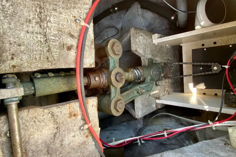 Slide: The Image of 1977 Allied Princess Cutter machinery with chains and cables in a mechanical setup. - 30