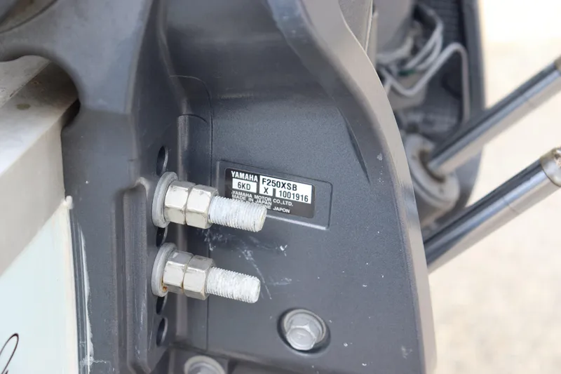 Slide: The Image of Close-up of Yamaha F250XSB engine on 2023 Sea Hunt Ultra 234 boat. - 20