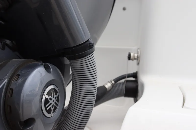 Slide: The Image of Close-up of 2023 Sea Hunt Ultra 234 boat engine components. - 22