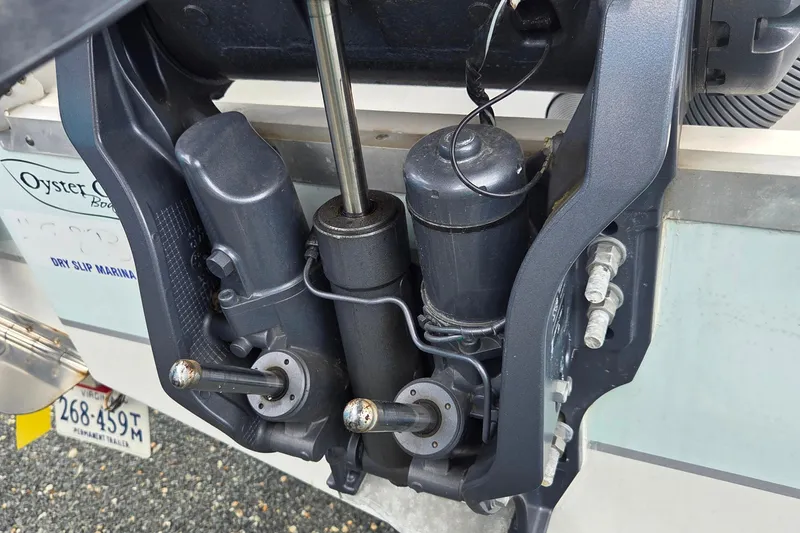 Slide: The Image of Close-up of 2023 Sea Hunt Ultra 234 boat engine components. - 28