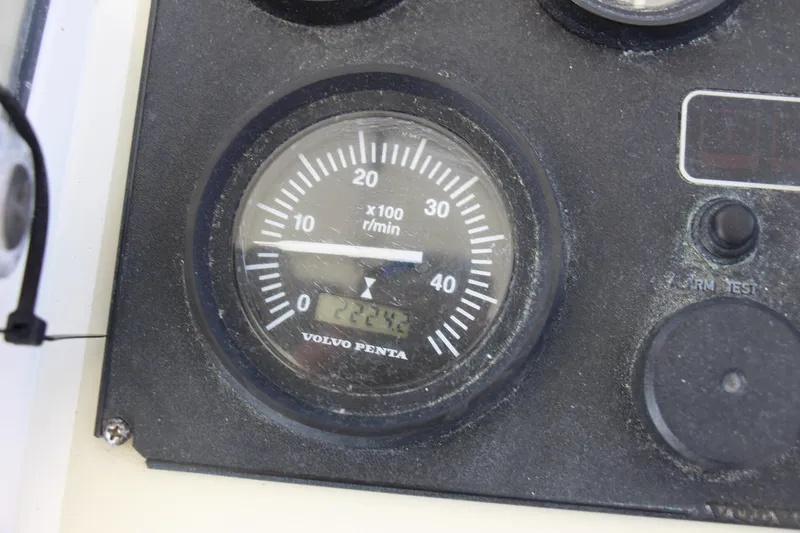 Slide: The Image of Close-up of a Volvo Penta tachometer on a 2004 Carolina Classic 28 boat. - 17