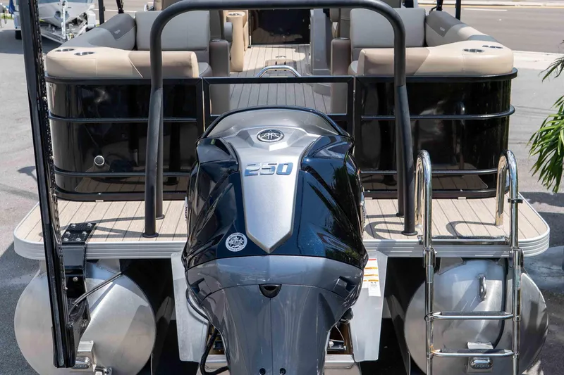 Slide: The Image of 2022 Veranda Relax VR25RC pontoon boat with powerful 250 engine, rear view. - 6