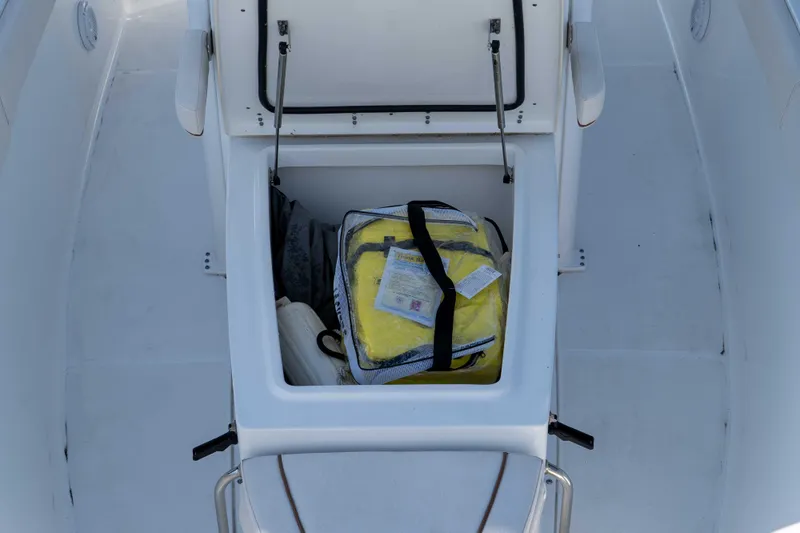 Slide: The Image of Open storage compartment on 2022 Sea Hunt Gamefish 27 Coffin Box boat. - 11