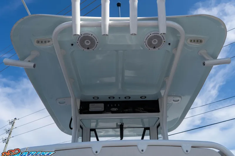 Slide: The Image of 2022 Sea Hunt Gamefish 27 Coffin Box boat top view with speakers and rod holders. - 18