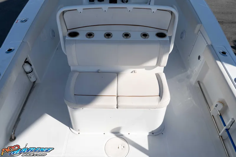 Slide: The Image of 2022 Sea Hunt Gamefish 27 Coffin Box boat interior with seating and storage. - 22