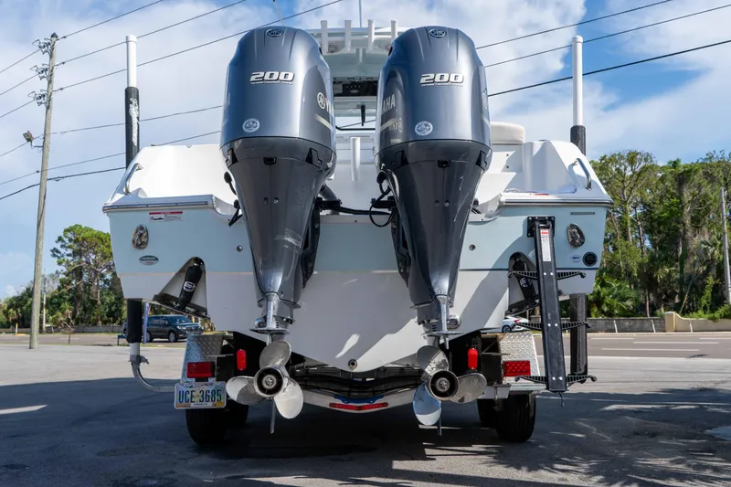Slide: The Image of 2022 Sea Hunt Gamefish 27 Coffin Box with dual Yamaha 200 engines, rear view. - 6