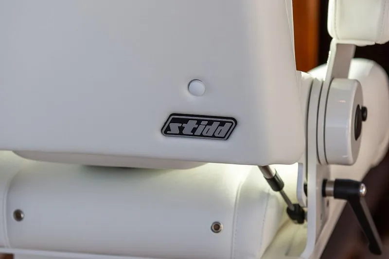 Slide: The Image of White Stidd seat on 2023 Hinckley Picnic Boat 34 S, showcasing luxury marine design. - 18