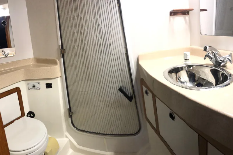 Slide: The Image of Bathroom interior of 2002 Catalina 42 MkII yacht with sink, toilet, and shower. - 11