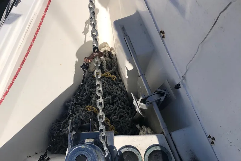 Slide: The Image of Anchor chain and rope in the bow of a 2002 Catalina 42 MkII sailboat. - 15