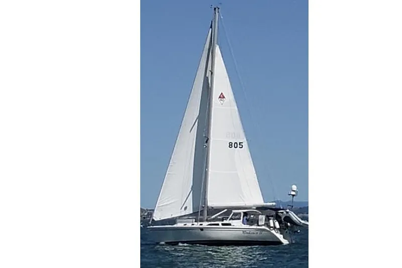 Slide: The Image of Sailing yacht Catalina 42 MkII, 2002 model, gliding on open water under clear skies. - 21