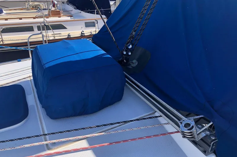 Slide: The Image of Deck of 2002 Catalina 42 MkII sailboat with blue covers and rigging. - 24