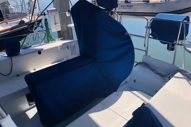 Slide: The Image of 2002 Catalina 42 MkII sailboat cockpit with blue protective covers. - 28