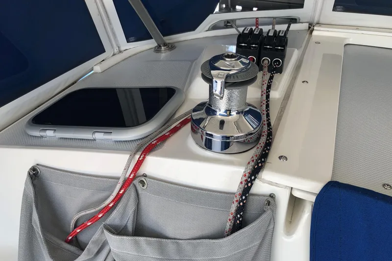 Slide: The Image of Sailing equipment on a 2002 Catalina 42 MkII yacht, featuring winch and ropes. - 31