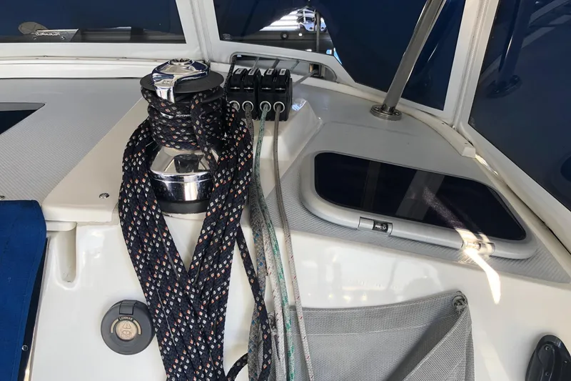 Slide: The Image of Deck of 2002 Catalina 42 MkII sailboat with winch and ropes. - 32