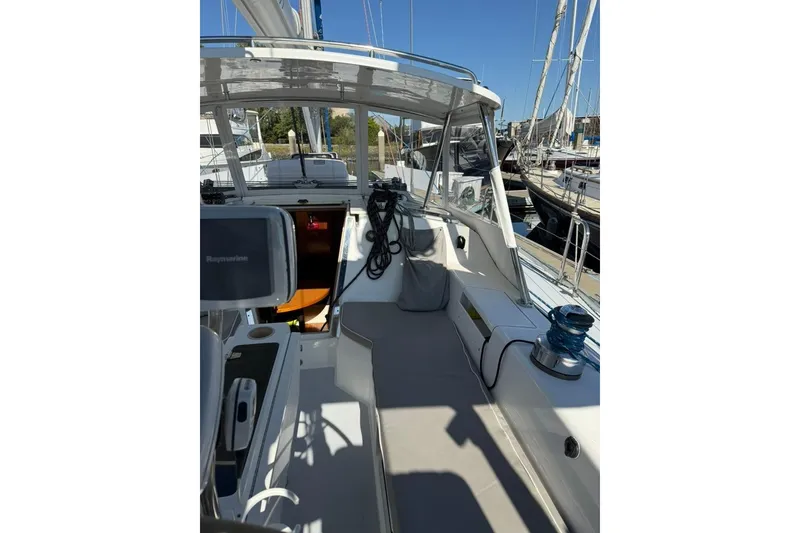 Slide: The Image of 2002 Catalina 42 MkII sailboat cockpit with seating and navigation equipment. - 33