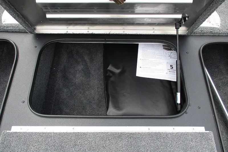 Slide: The Image of Open storage compartment in 2026 Tracker Pro Team 175 Crappie Edition boat. - 13