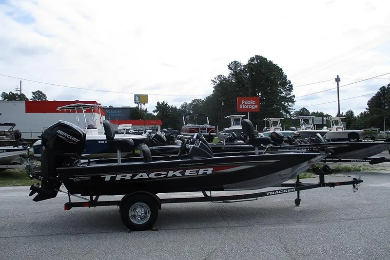 Slide: The Image of 2026 Tracker Pro Team 175 Crappie Edition boat on trailer, outdoor display. - 2