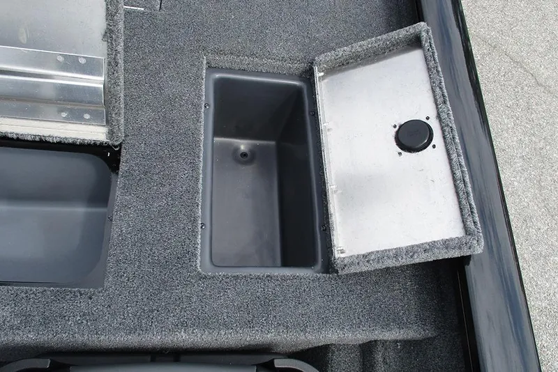 Slide: The Image of 2026 Tracker Pro Team 175 Crappie Edition boat storage compartment with open lid. - 22