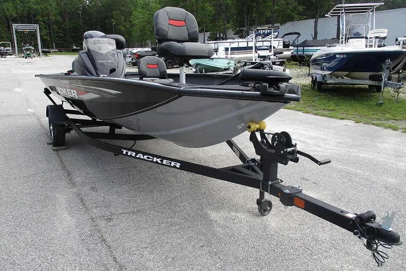 Slide: The Image of 2026 Tracker Pro Team 175 Crappie Edition boat on trailer, parked outdoors. - 3