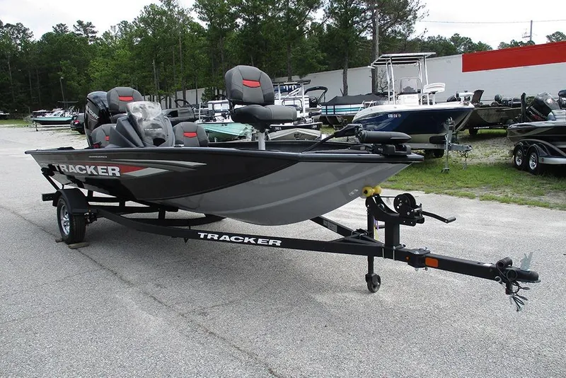 Slide: The Image of 2026 Tracker Pro Team 175 Crappie Edition boat on trailer, parked outdoors. - 5