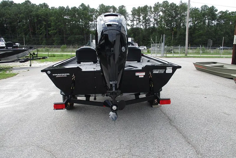 Slide: The Image of 2026 Tracker Pro Team 175 Crappie Edition boat on trailer, rear view, outdoors. - 8