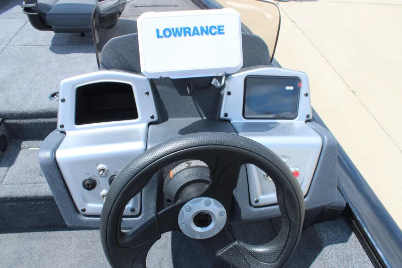 Slide: The Image of Steering console of 2026 Tracker Pro Team 175 boat with Lowrance display. - 11