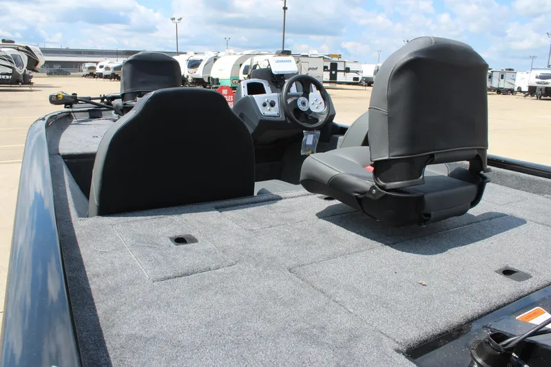 Slide: The Image of 2026 Tracker Pro Team 175 boat interior with seating and steering console. - 8