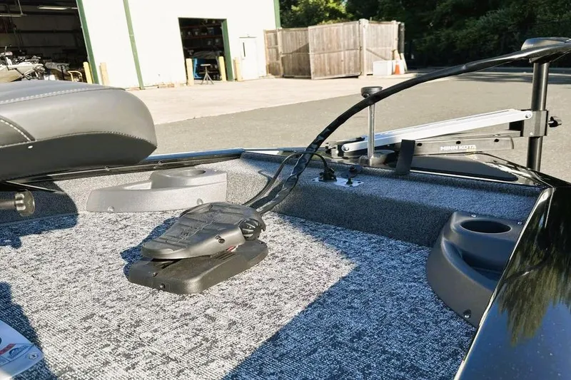 Slide: The Image of 2026 Tracker Pro Team 175 Crappie Edition boat interior with Minn Kota trolling motor. - 4