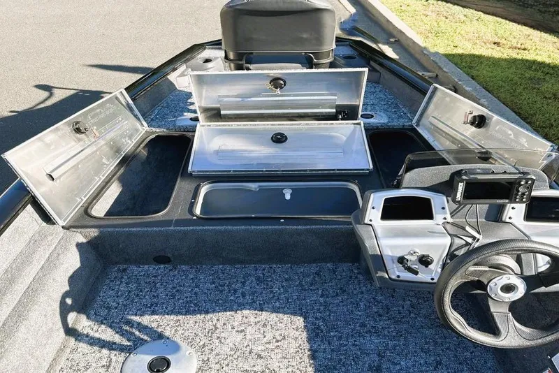 Slide: The Image of 2026 Tracker Pro Team 175 Crappie Edition boat interior with open storage compartments. - 6