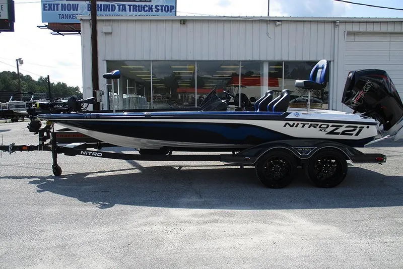 The Image of 2026 Nitro Z21 XL Pro boat parked outside a dealership. - 1