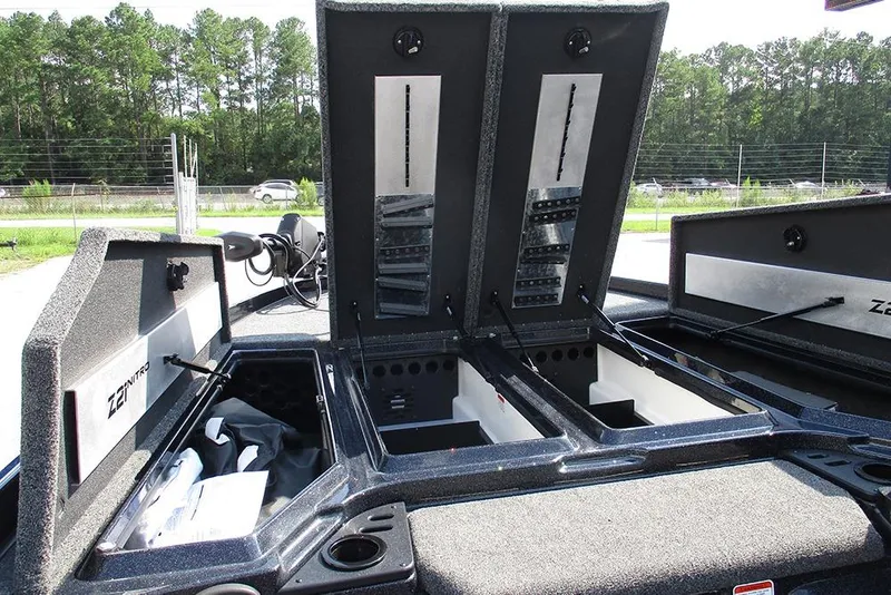 Slide: The Image of 2026 Nitro Z21 XL Pro boat storage compartments open, showcasing interior design and organization. - 13