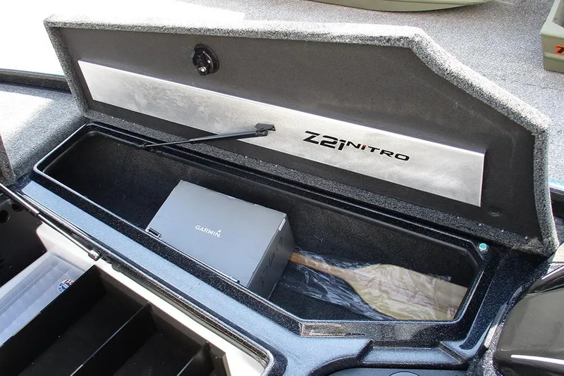 Slide: The Image of 2026 Nitro Z21 XL Pro storage compartment with Garmin device inside. - 16